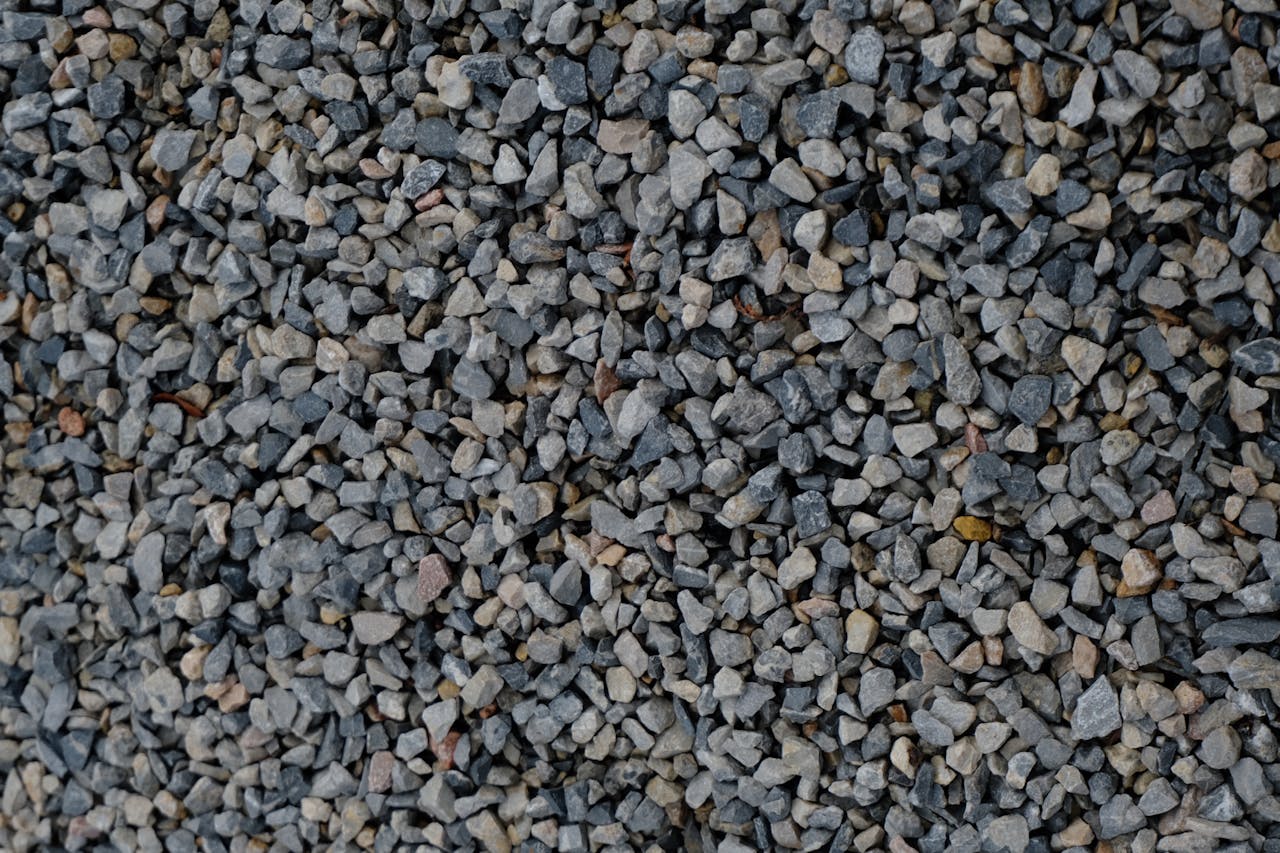 digital High-resolution image of crushed gravel stones, ideal for construction and landscaping projects.